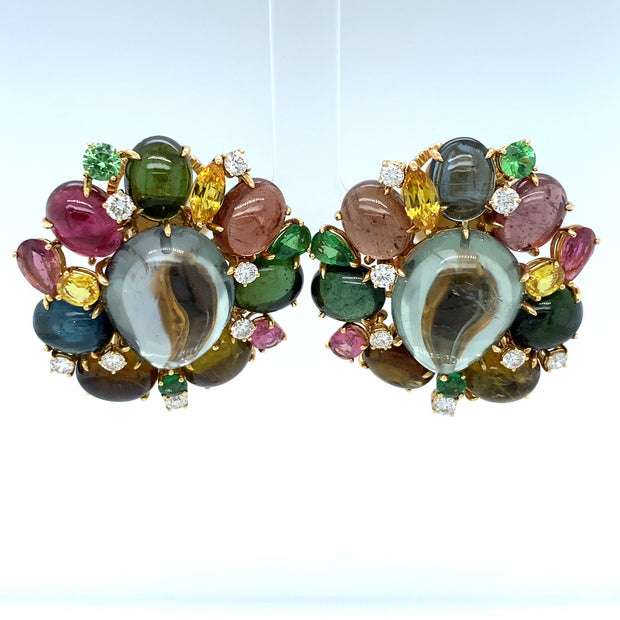 Multi colour tourmaline earrings featuring a myraid of gemstones, crafted in 18 karat yellow gold.