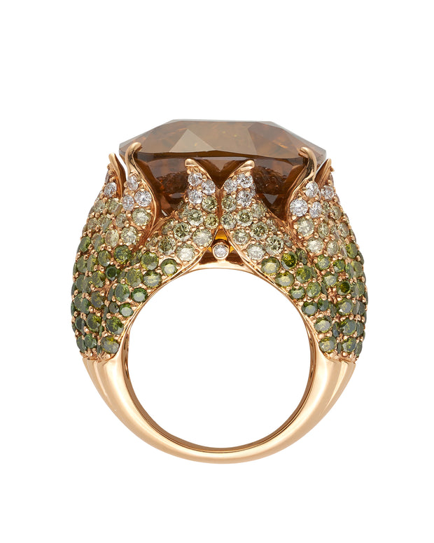 Exceptional zircon, set with graduated green and white diamonds, crafted in 18 karat rose gold.