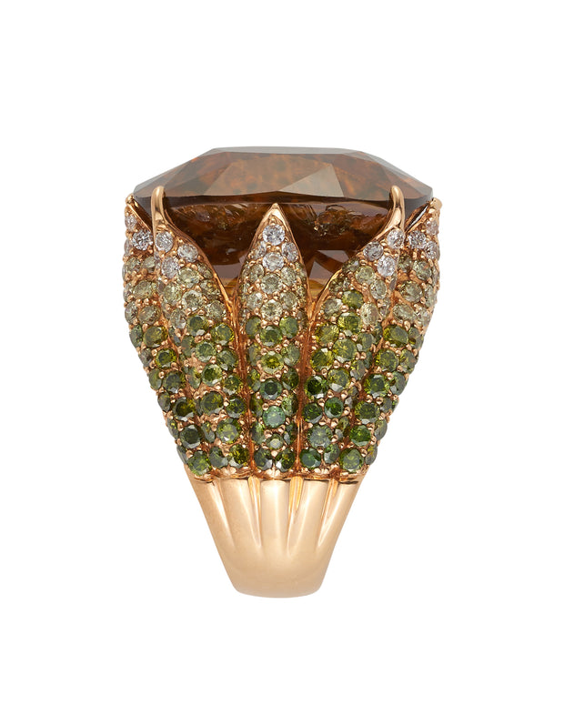 Exceptional zircon, set with graduated green and white diamonds, crafted in 18 karat rose gold.