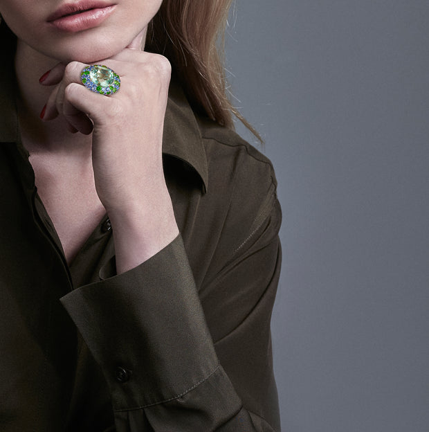 Paraiba tourmaline ring, with a myriad of gemstones, crafted in 18 karat white gold.