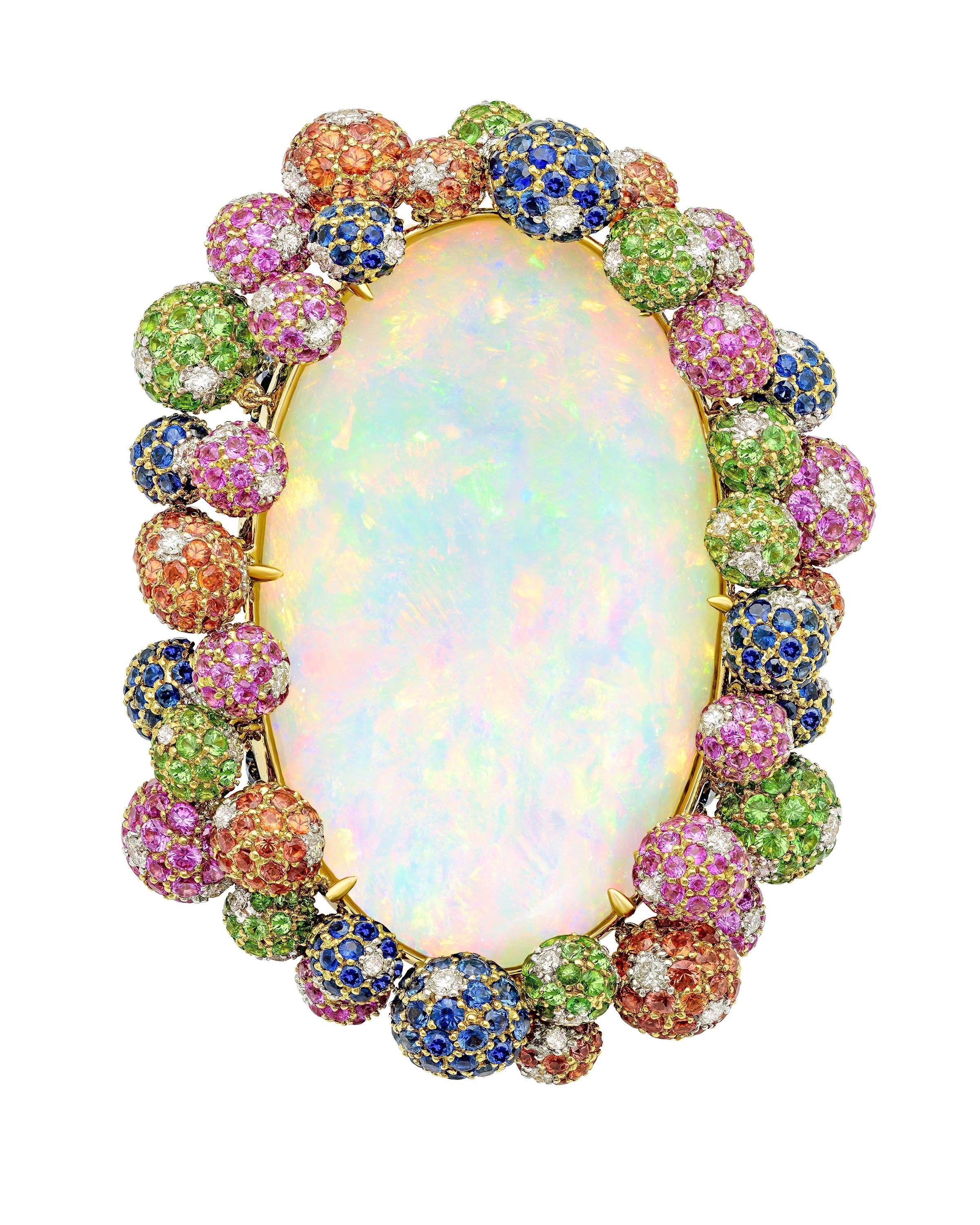 "en tremblant" Ethiopian opal ring set with a myriad of gemstones, crafted in 18 karat yellow gold.