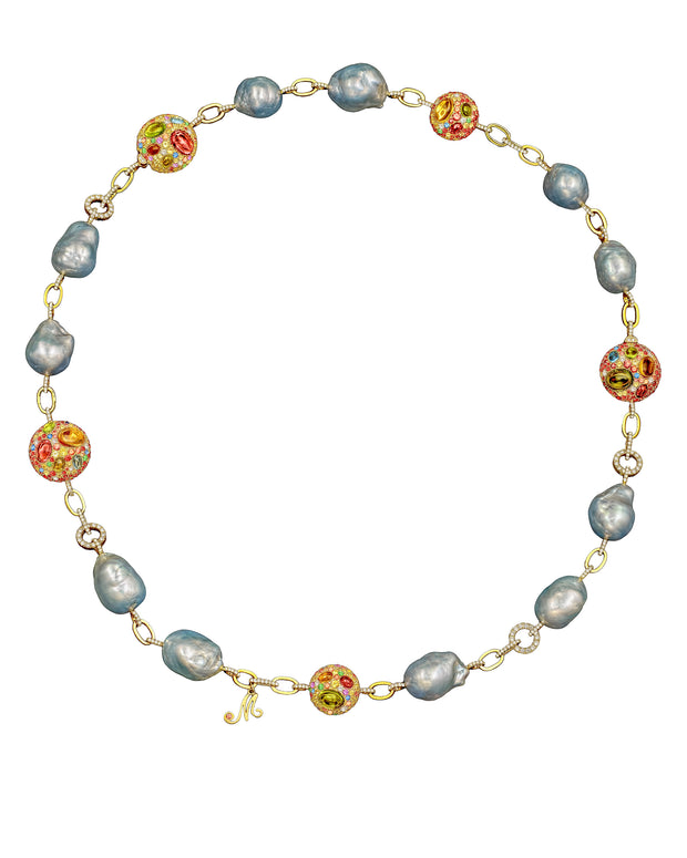 South Sea pearl necklace enhanced with 'pebbles' with a myriad of gemstones, crafted in 18 karat yellow gold.