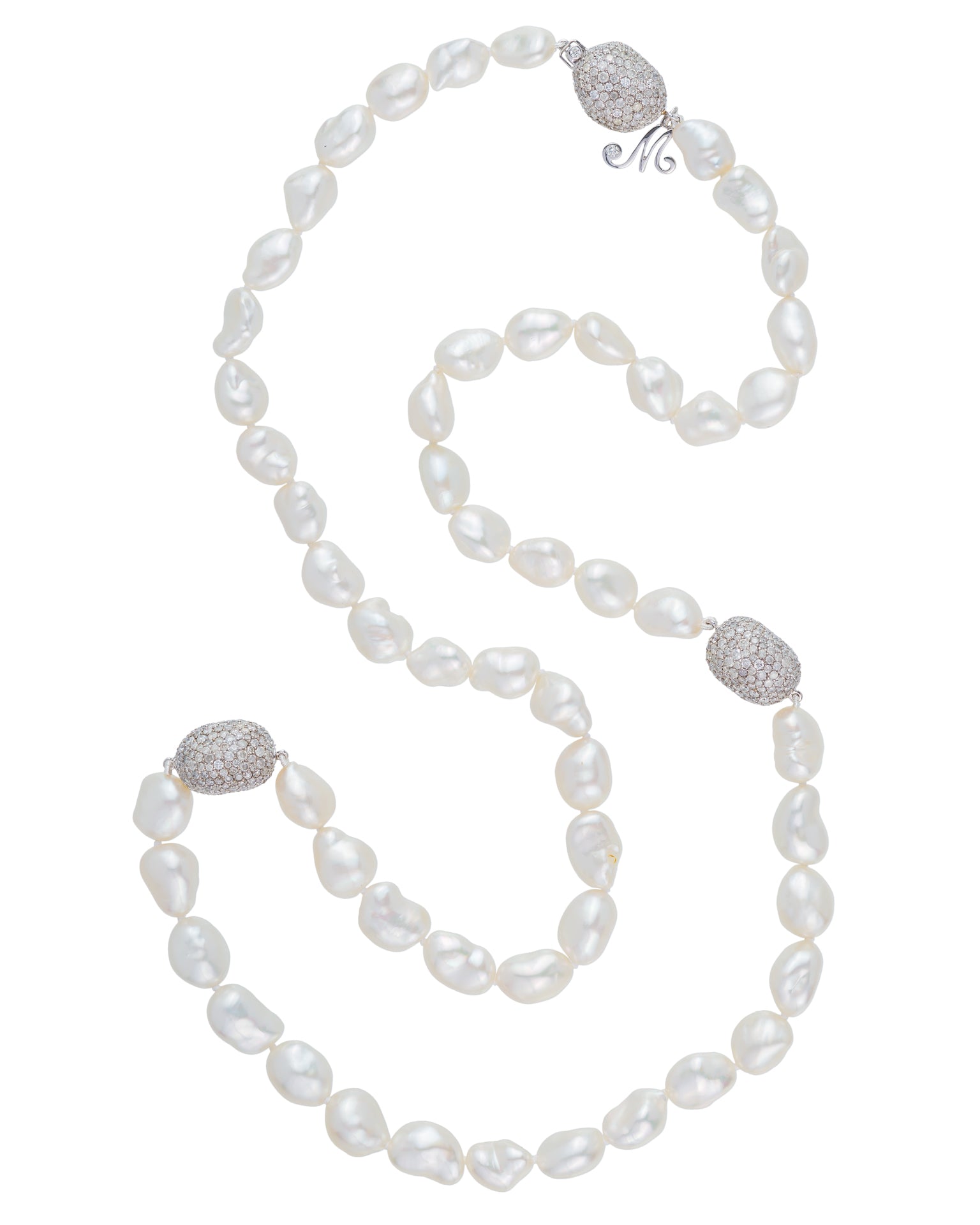 South Sea Keshi pearl necklace featuring South Sea Keshi pearls with 'pebbles' set in with diamonds, crafted in 18 karat white gold.