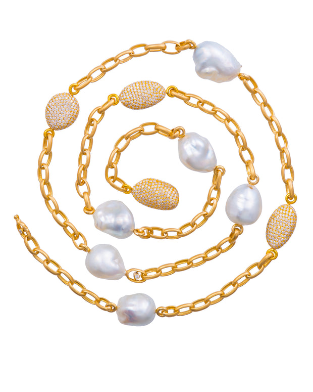 Australian South Sea pearl and diamond pebble necklace, crafted in 18 karat yellow gold.