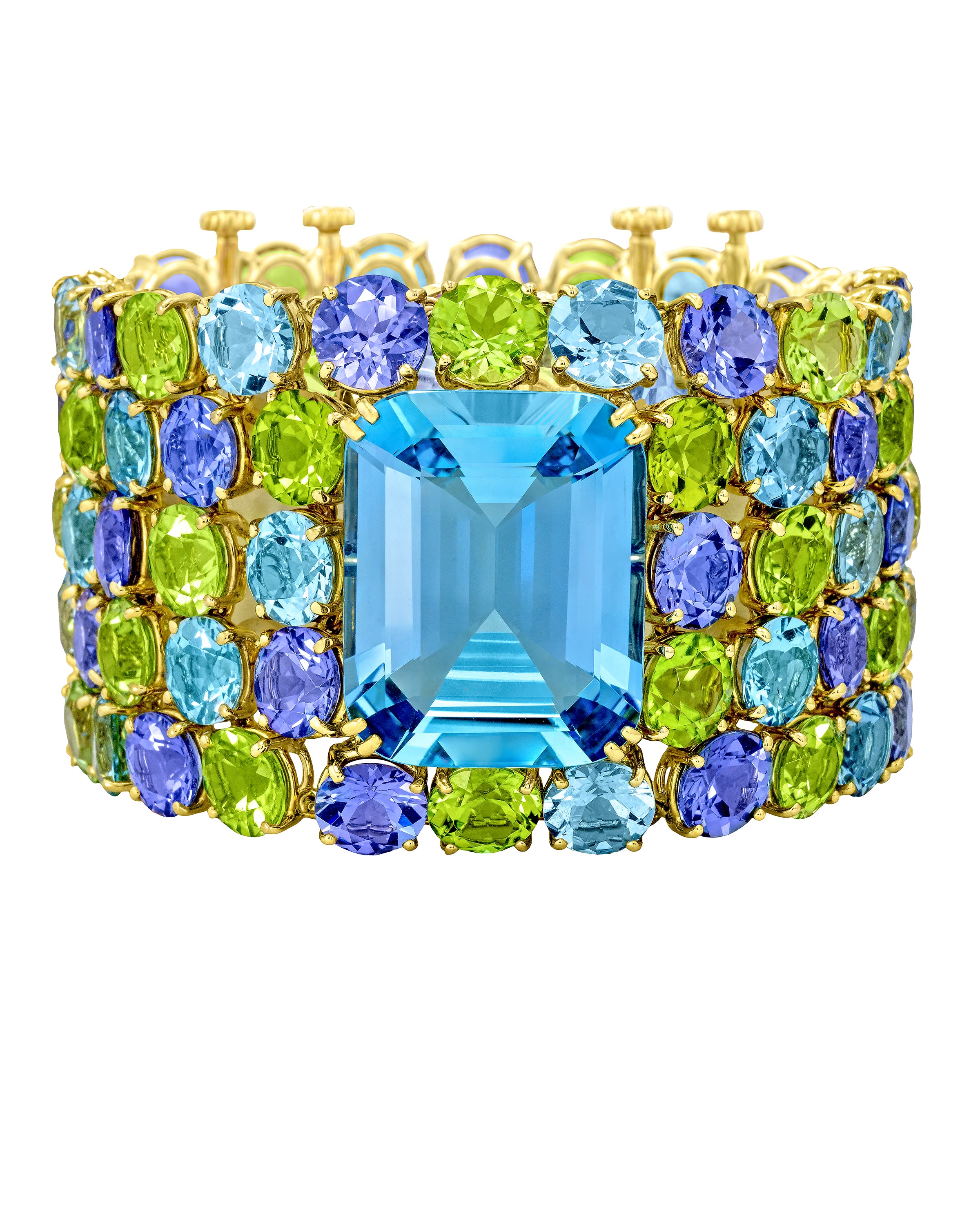 Deco Aquamarine Cuff with centre aqua accompanied by a myriad of gemstones, crafted in 18 karat yellow gold