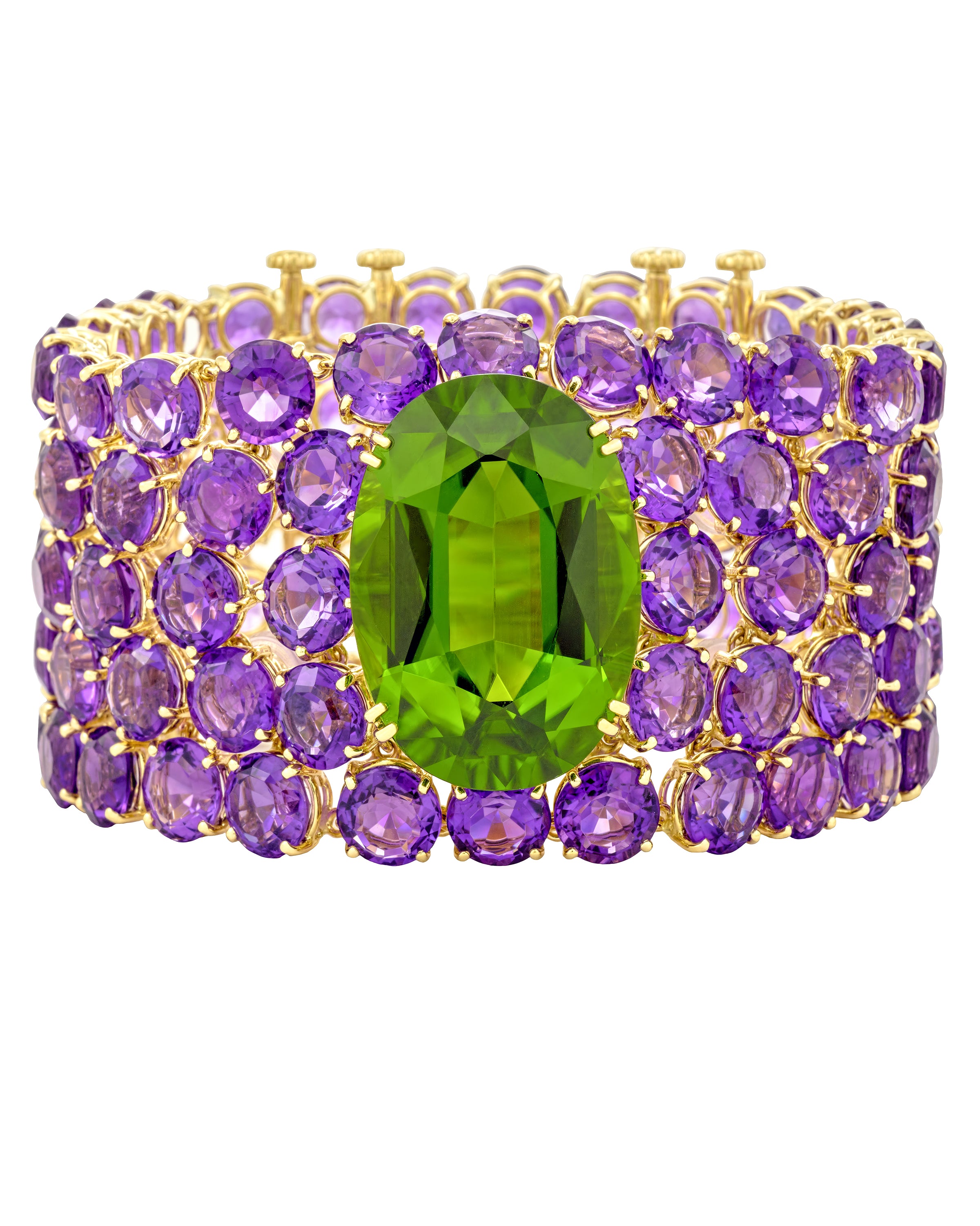 NYC Peridot cuff with amethyst, crafted in 18 karat yellow gold.