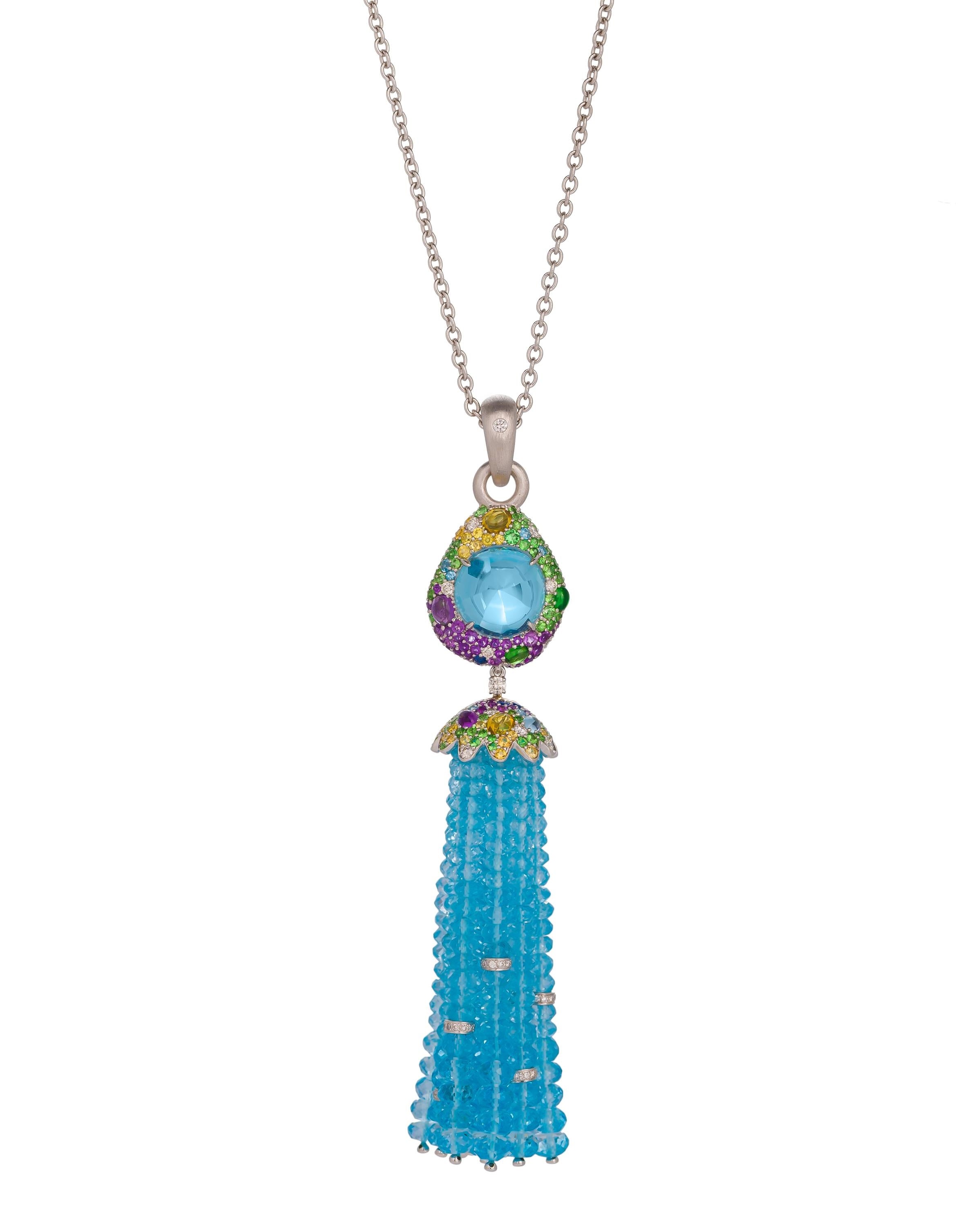 Blue topaz tassel pendant enhanced with a myriad of gemstones, crafted in 18 karat white gold