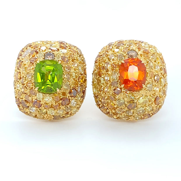 Mandarin garnet and peridot earrings, surrounded by cognac diamonds, crafted in 18 karat yellow gold.