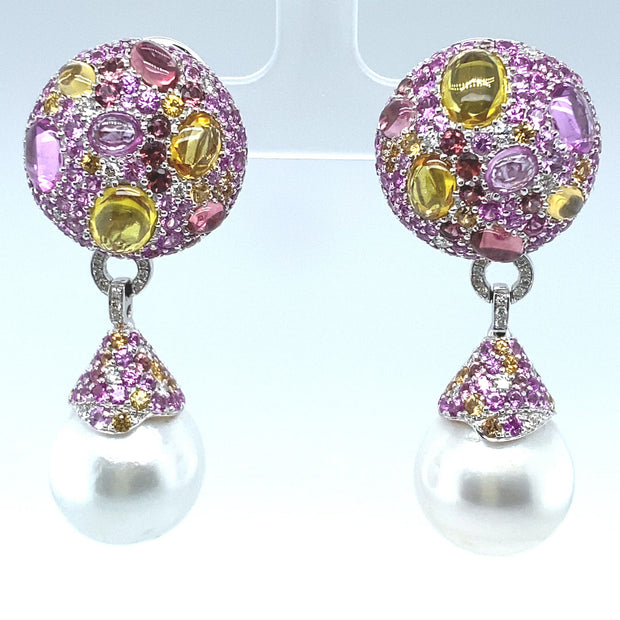 "Cookie" pink sapphire earrings, featuring capped South Sea Pearl pendant drops, crafted in 18 karat white gold.